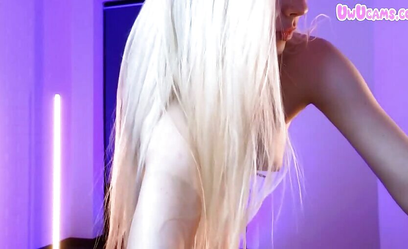 Blonde Bombshell Stripping Around A Pole